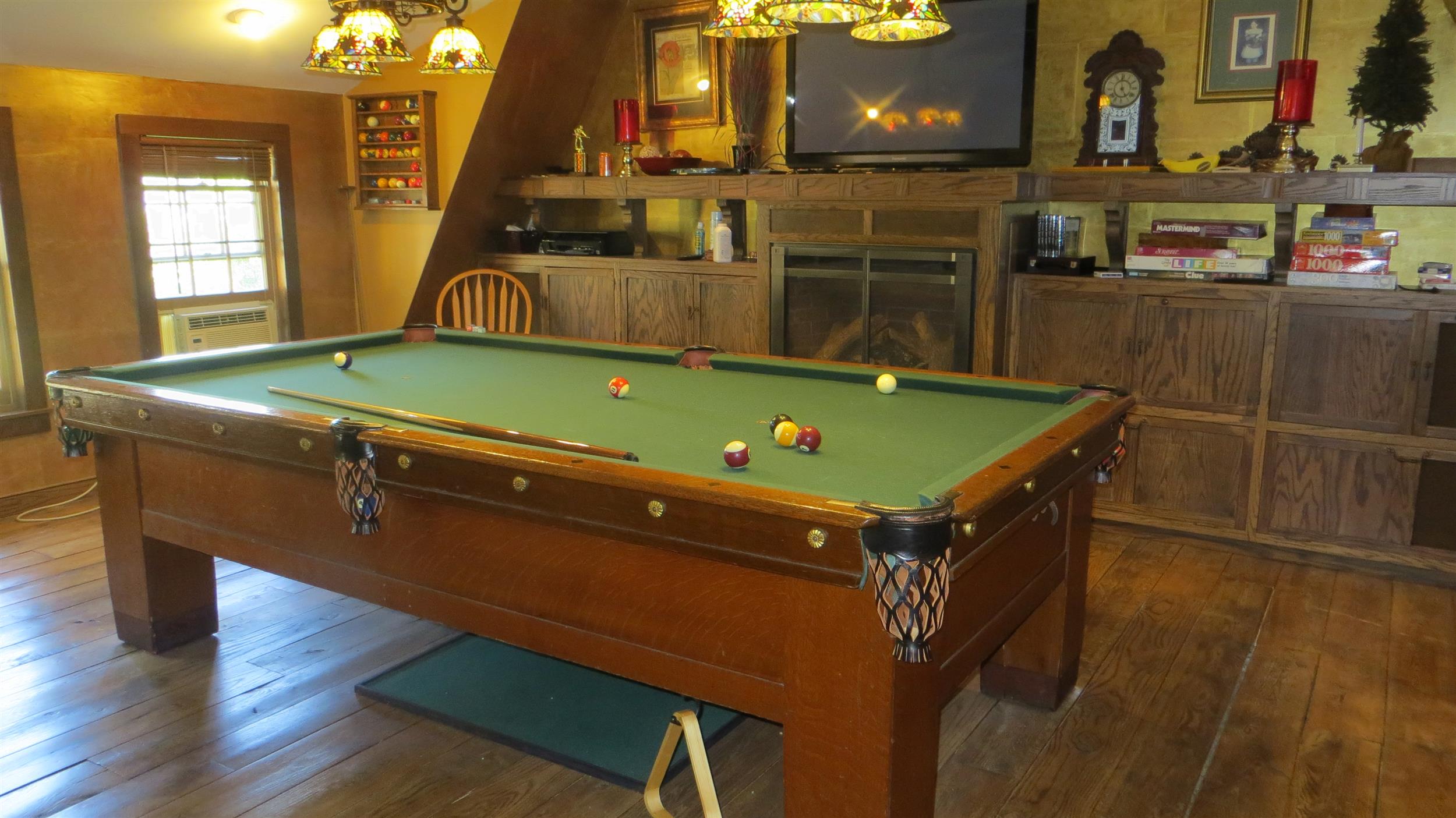 game-room-with-pool-table-and-fireplace.jpg